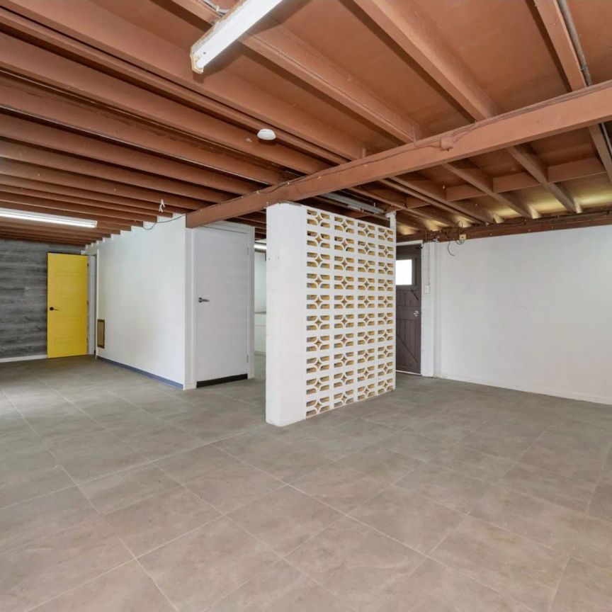 Spacious Dual-Level Home with Pool & Shed in Prime Location - Photo 1