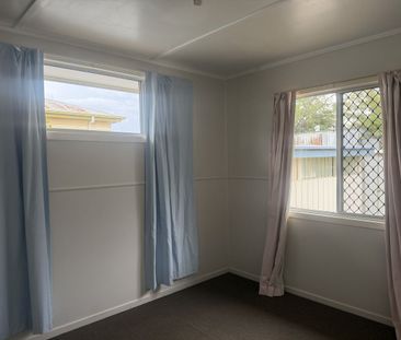 Tidy Home Close to Town and Park - Photo 1