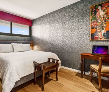 Sub-Penthouse Elegance with Stunning Ocean Views - Photo 4