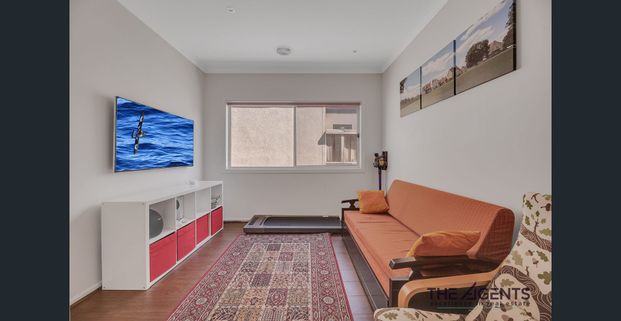 Perfect Family Home with Multiple Living Areas & Modern Comforts - Photo 1