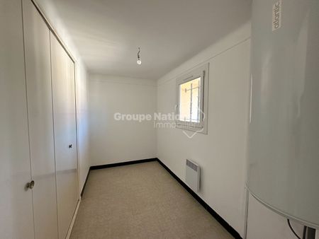 Location Appartement 3 pièces 91m² - Photo 3