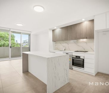 LUXURY UNIT WITH 2ND BEDROOM OR STUDY - Photo 1