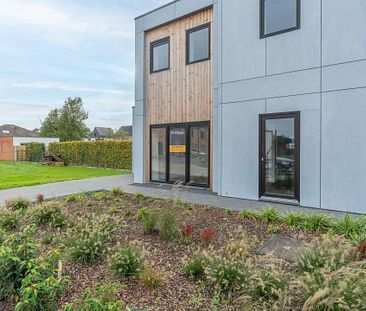 Knappe en energiezuinige woning met drie slaapkamers en carport op perceel van 331 m² - Foto 1