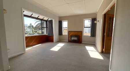 ELEVATED THREE BEDROOMS IN A PRIME LOCATION - Photo 3