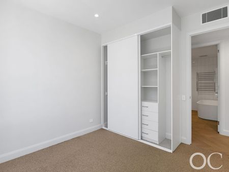 Open the Door to Luxurious Sub-Penthouse Living with Panoramic Coastal and River Views - Photo 3