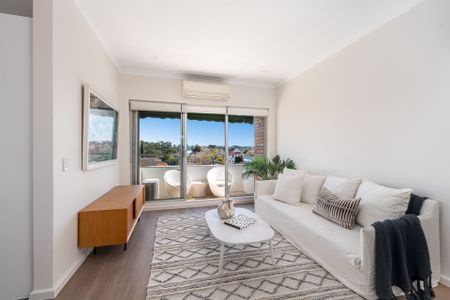 Renovated Apartment with Privacy & District Views - Photo 2