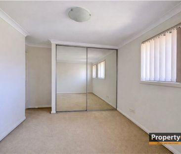 *Modern 2-Bedroom, 3-Bathroom Townhouse in Prime Location* - Photo 3