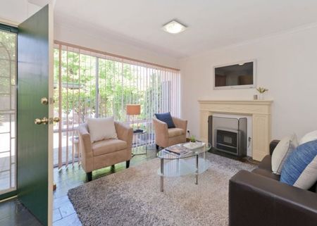 Two Bedroom Townhouse in Great Location! - Photo 3