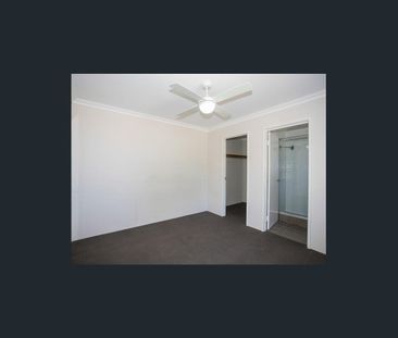 Coastal Comfort: Your Family Home Steps Away from the Beach! - Photo 1