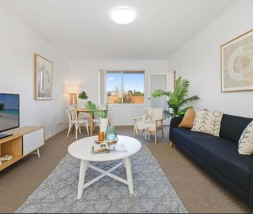 Sun-Drenched Ashfield Sanctuary with Lock-Up Garage! - Photo 1