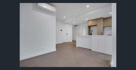 Stylish 2-Bedroom Apartment with Resort-Style Amenities in the Heart of Ivanhoe - Photo 3