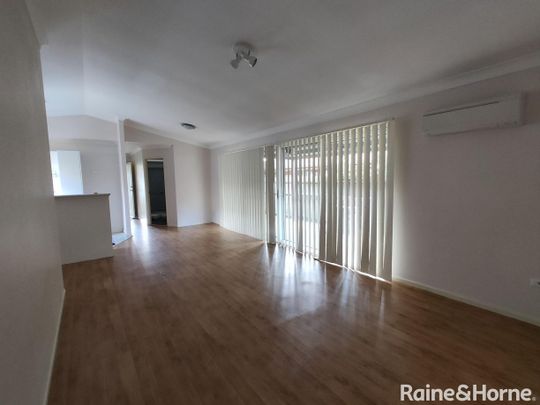 Spacious 3-Bedroom Home in a Great Location - Photo 1