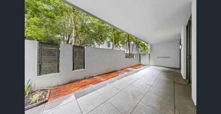 Mirvac Built | Great Location | Large Living Area | Huge Courtyard - Photo 4