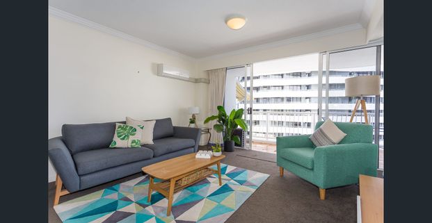 Fully Furnished 8th Floor Corner Apartment - Photo 1