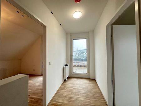 Modernes Wohnen in Brigittenau - 4-Zimmer-DG-Wohnung mit drei Freiflächen - Photo 3