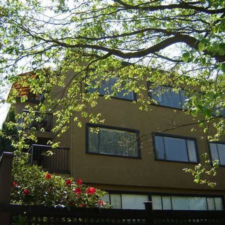 Charming 2-Bedroom Furnished Suite Steps from Kits Beach! - Photo 1