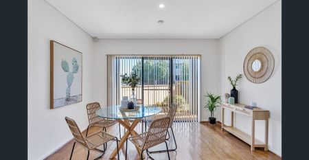 Modern 3-Bedroom Townhouse in the Heart of Mawson Lakes - Photo 2