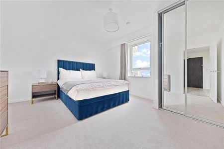 This contemporary apartment is located within Wallbrook Gardens, a beautiful development benefitting from exceptional on site amenities, communal gardens and only a 6 minute walk to Canning Town Station. - Photo 4