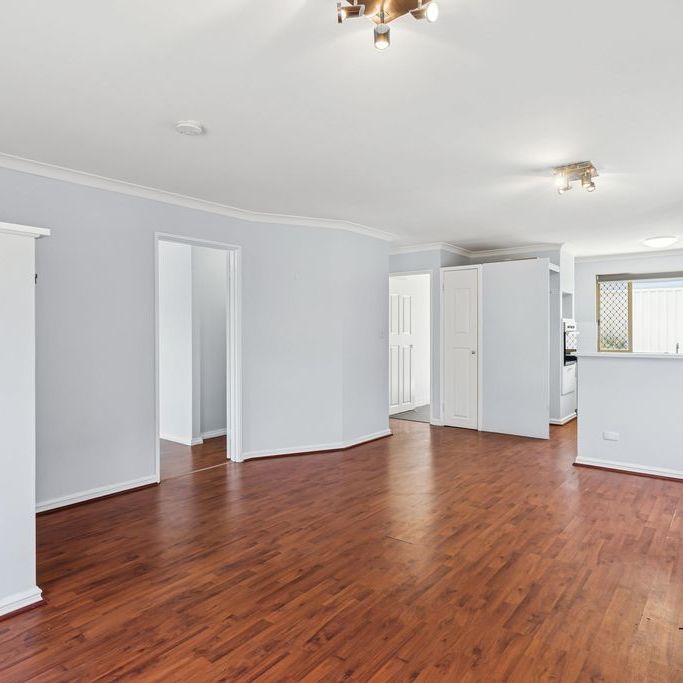 Comfort & Convenience in Queens Park - Photo 1