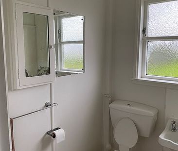 Tidy 2 Bedroom with large backyard - Photo 3