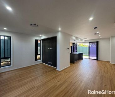 STUNNING 4-BEDROOM FAMILY HOME IN INGLEBURN | MODERN & STYLISH - Photo 1