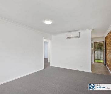 Freshly renovated 2-bedroom unit - Photo 2