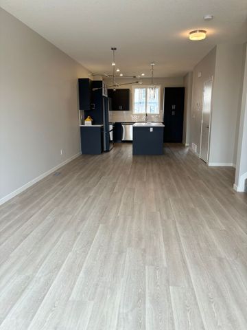 3 Bedroom 1 Den Townhouse in Airdrie - Available November 1, 2025 - Photo 2