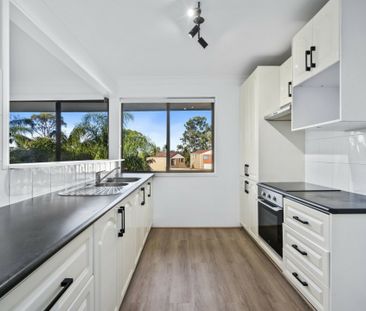 SPACIOUS & STYLISH WITH DOUBLE LOCK UP GARAGE - Photo 6