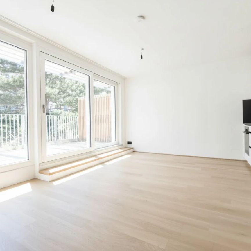 Pauschalmiete inklusive Warmwasser & Heizung/Kühlung - Moderne 2-Zimmer-Wohnung mit schöner Terrasse in den Hof - Stilvolle Ausstattung - Foto 1