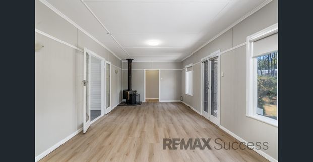 Spacious Family Home with Multiple Living Areas in Prime Rangeville Location - Photo 1