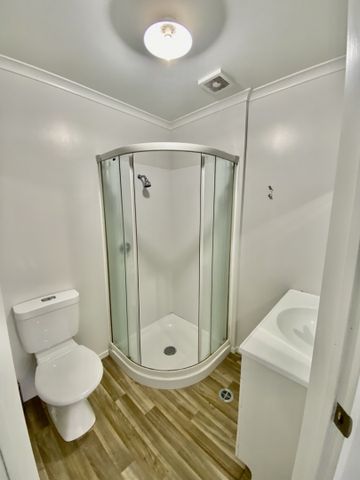 This beautiful and modern upstairs unit is just a 5-minute walk to Waikato & Braemar Hospitals and a stone's throw away from the CBD & Wintec. - Photo 3