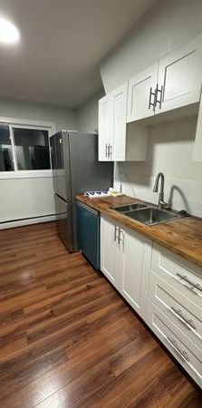 Spacious 2bd apartment with ALL utilities & assigned parking included - Photo 1