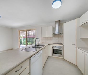 Low-Set & Low-Maintenance Living - Photo 4