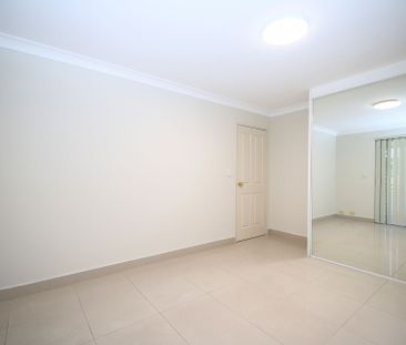 Freshly Painted 2 bedroom unit - Photo 1