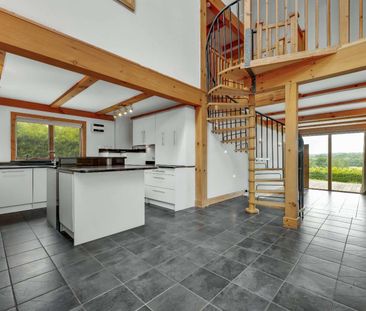Hanger Lodge occupies an enviable setting, down a quiet country lan... - Photo 5