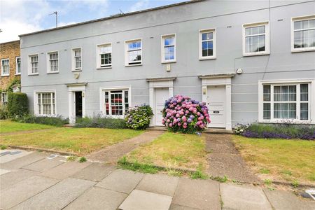 A beautifully presented three bedroom house with large west facing garden in a fantastic Islington location just moments from Highbury & Islington station. - Photo 4