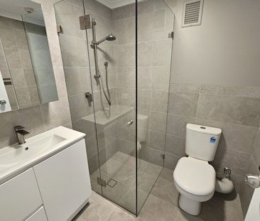 IMPECCABLY RENOVATED APARTMENT OFFERING COMFORT, STYLE AND CONVENIENCE - Photo 6