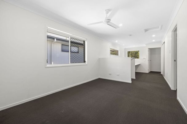 Modern Family Home with Multiple Living Areas in Convenient Bellbird Park Location - Photo 1