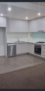 Recently painted secure 2 bed 1 bath unit - Photo 4