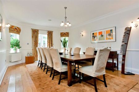 Situated in grounds of just over half an acre and located in one of Esher's most sought after private roads close to High Street. - Photo 3