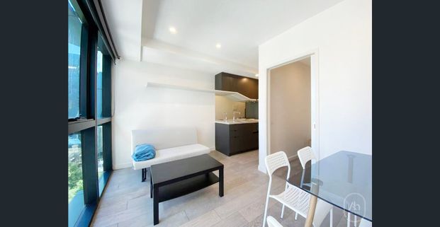 Modern Elegance in the Heart of Melbourne | One-bedroom Furnished Apartment - Photo 1