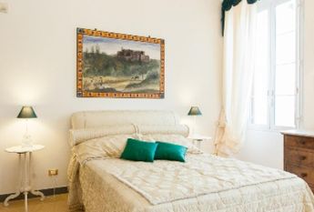 Center-Historic Jewish Quarter: Elegant apartment situated in beautiful Palazzo Nobiliare. Entrance, spacious living with original wood frescoed ceilings, large modern dining and kitchen, 4 bedrooms, 4 Baths, small terrace. #1527
