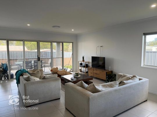 MODERN FAMILY HOME OFFERING PEACE AND QUIET - Photo 1