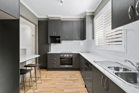 SPACIOUS THREE BEDROOOM UNIT AVAILABLE - Photo 3