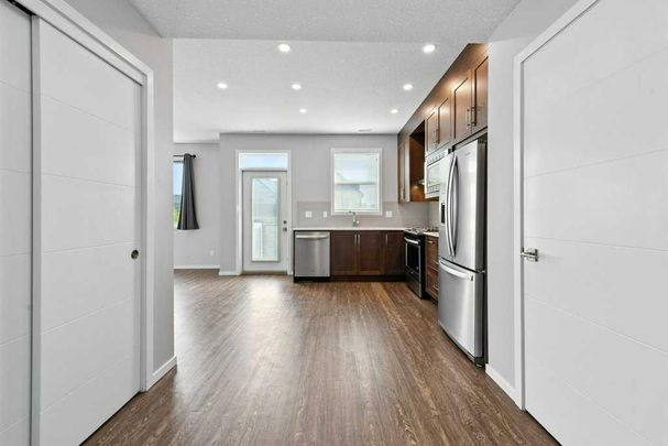 Quiet & Contemporary 3 Bed Townhouse | Close To Cross Iron Mall. Garage & A/C Included - Photo 1