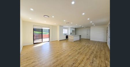 Stylish Family Living in a Peaceful Location - Photo 2