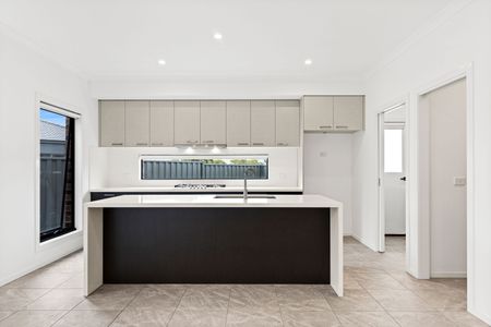 Spacious 4-Bedroom Home with Modern Features in Wollert - Photo 3