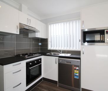 Secure, Private & Convenient Coastal Living - Photo 3