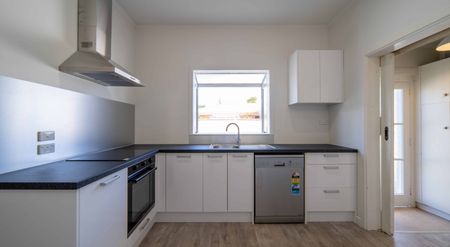 Renovated Three-Bedroom Home - Photo 2