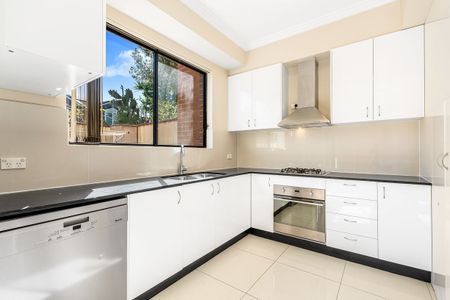 Impressive Full-Brick Townhouse with Premium Features! - Photo 4